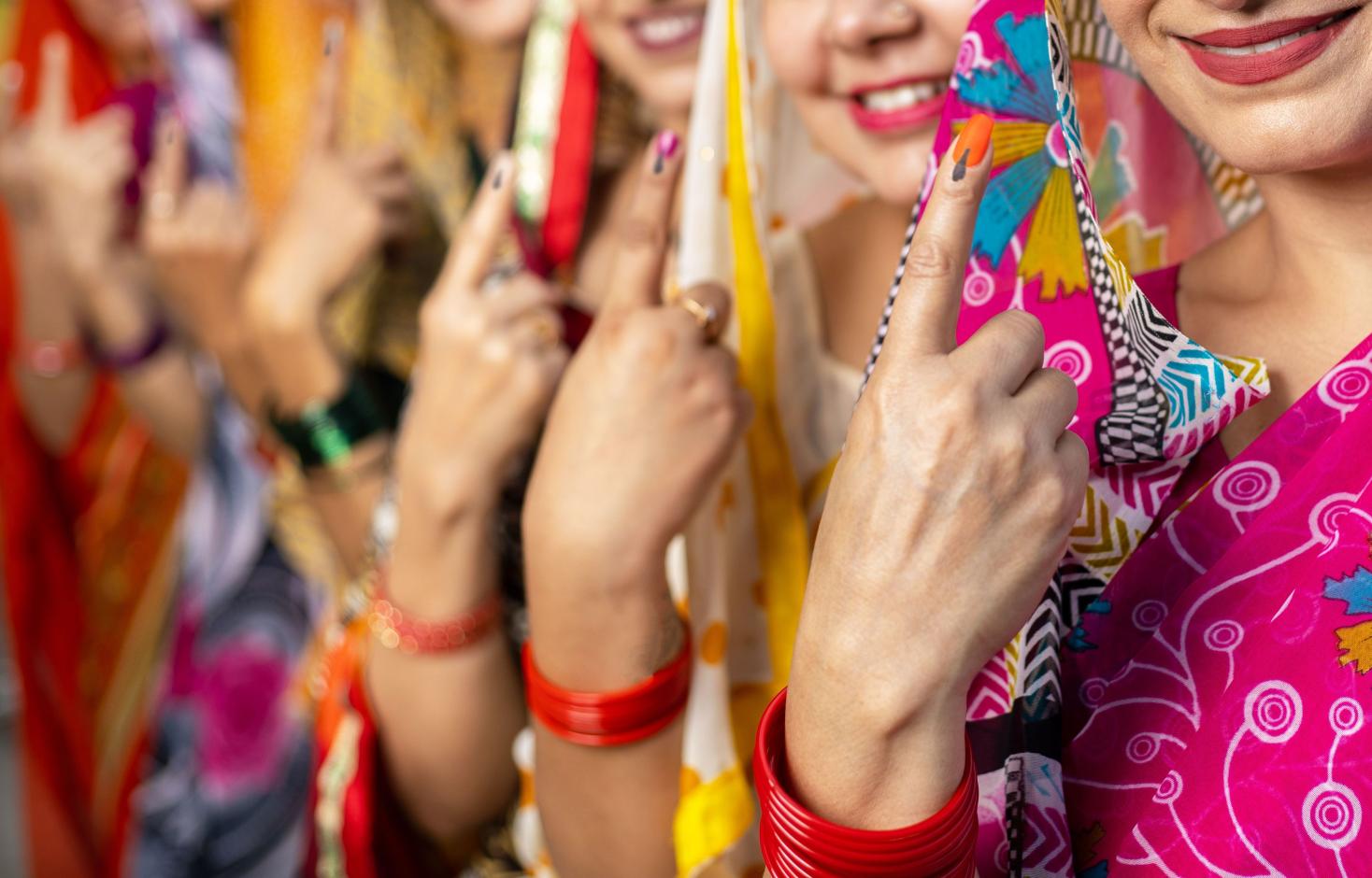 Indian women voting finger