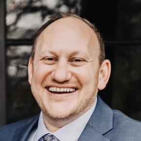 image of male wearing a blue suit