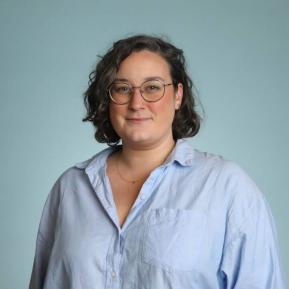 Image of woman with short hair wearing glasses