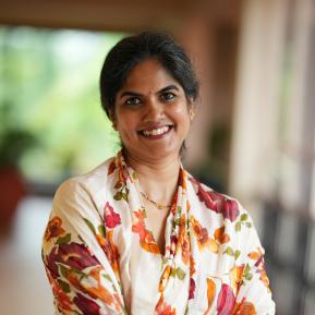 image of female wearing a floral saree