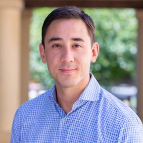 image of male wearing a blue and white checked shirt