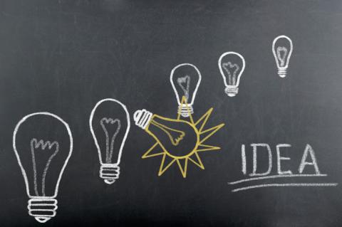 Illustration of light bulbs and "idea"