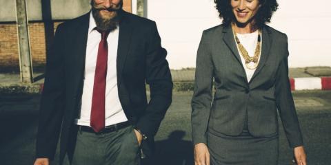 A man and woman in business attire