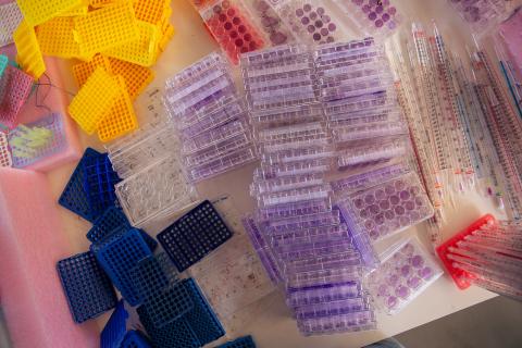 Dozens of plastic cases for test tubes and other scientific equipment