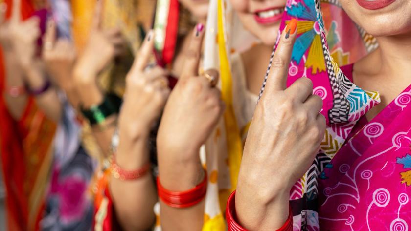 Indian women voting finger